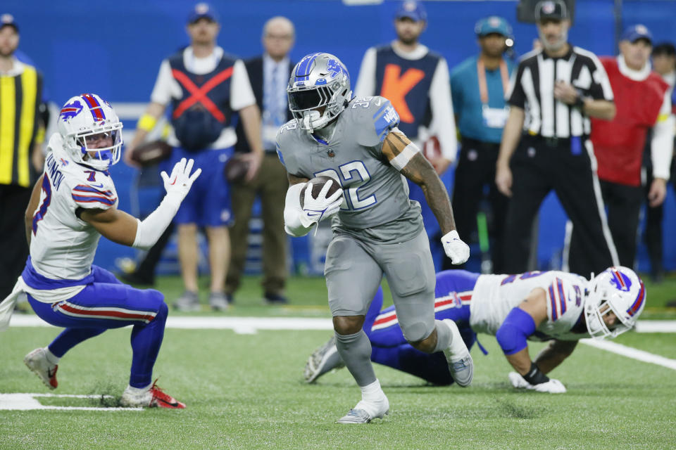 Detroit Lions running back D'Andre Swift rushes during the second half of an NFL football game against the Buffalo Bills, Thursday, Nov. 24, 2022, in Detroit. (AP Photo/Duane Burleson)