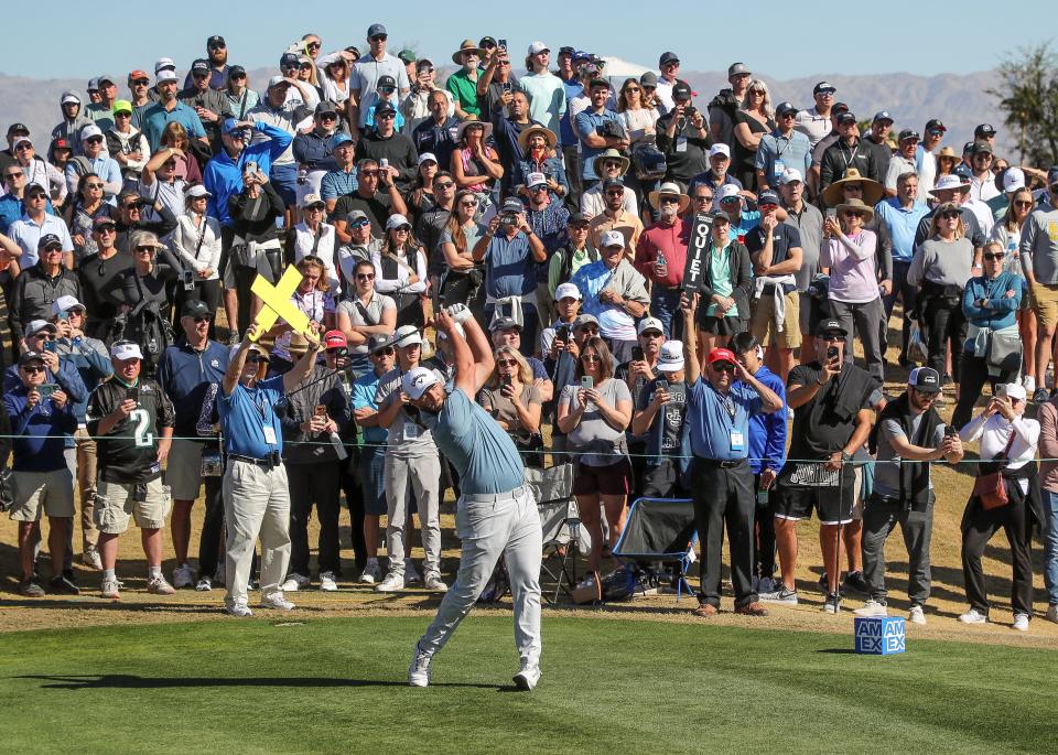 Jon Rahm tees off on the eighth hole at the Pete Dye Stadium Course at PGA West during The American Express in La Quinta, Calif., Jan. 21, 2023. 