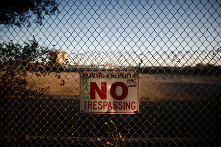 A "No Trespassing" sign is seen in the Port Lands, where Alphabet Inc, the owner of Google, is expected to develop an area of Toronto's waterfront after they announced the project "Sidewalk Toronto", using new technologies to develop high-tech urban areas in Toronto, Ontario, Canada, October 17, 2017. REUTERS/Mark Blinch