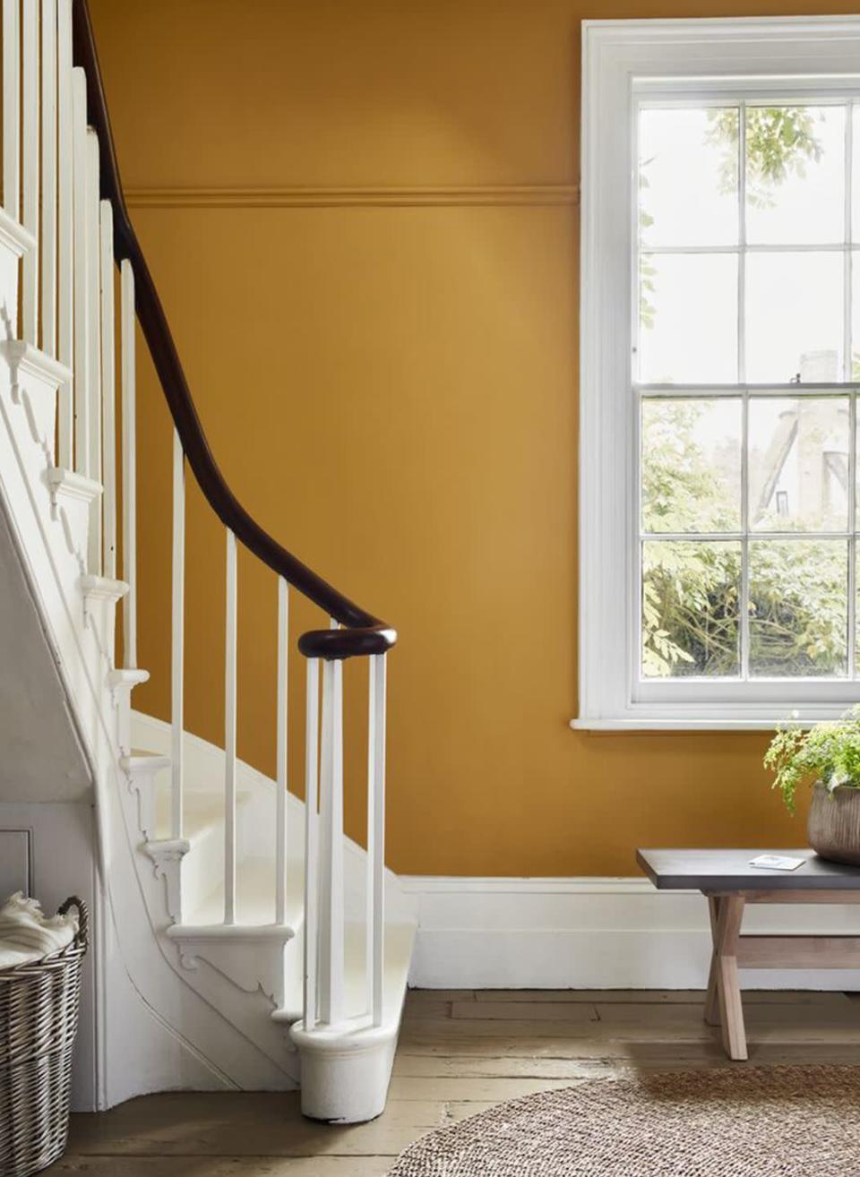 <p>'Hallways are typically smaller spaces, so we can afford to add more colour as we are merely passing through to our main living spaces,' says Gillian C. Rose, colour scientist, interior designer and founder of <a href="https://www.thescienceofcolor.com/" rel="nofollow noopener" target="_blank" data-ylk="slk:The Science of Colour" class="link ">The Science of Colour</a>. This warm sunshine shade is a particularly good choice for an uplifting welcome. </p><p>Pictured: <a href="https://www.homebase.co.uk/brands/house-beautiful/house-beautiful-paint-collection.list" rel="nofollow noopener" target="_blank" data-ylk="slk:House Beautiful Earth Notes EN.06 Paint at Homebase" class="link ">House Beautiful Earth Notes EN.06 Paint at Homebase</a></p>