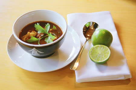 Tom yum soup with chilli and lemongrass crab dumplings