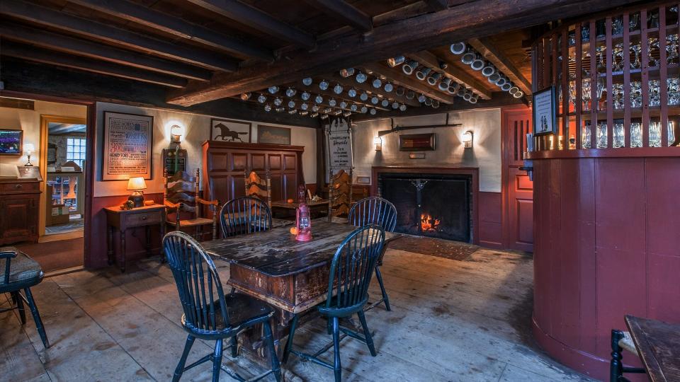 The fireplace in the tavern at Longfellow's Wayside Inn is lit every day by about 11 a.m.