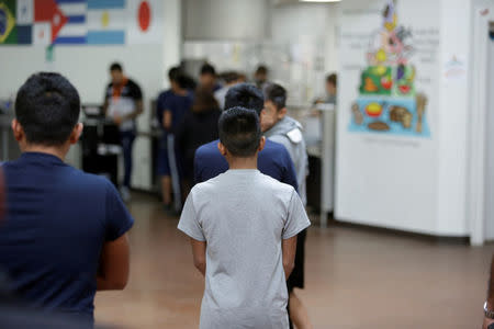 FILE PHOTO: Occupants at Casa Padre, an immigrant shelter for unaccompanied minors, in Brownsville, Texas, U.S., are seen in this photo provided by the U.S. Department of Health and Human Services, June 14, 2018. ACF/HHS/Handout via REUTERS