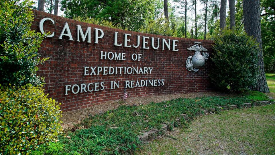 PHOTO: Signage stands on the main gate to Camp Lejeune Marine Base outside Jacksonville, N.C., April 29, 2022. (Allen G. Breed/AP, FILE)