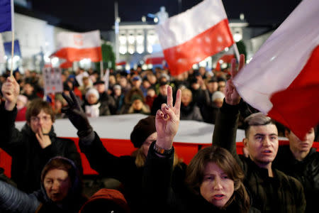 People gather in front of the Presidential Palace during a protest against judicial reforms in Warsaw, Poland, November 24, 2017. REUTERS/Kacper Pempel