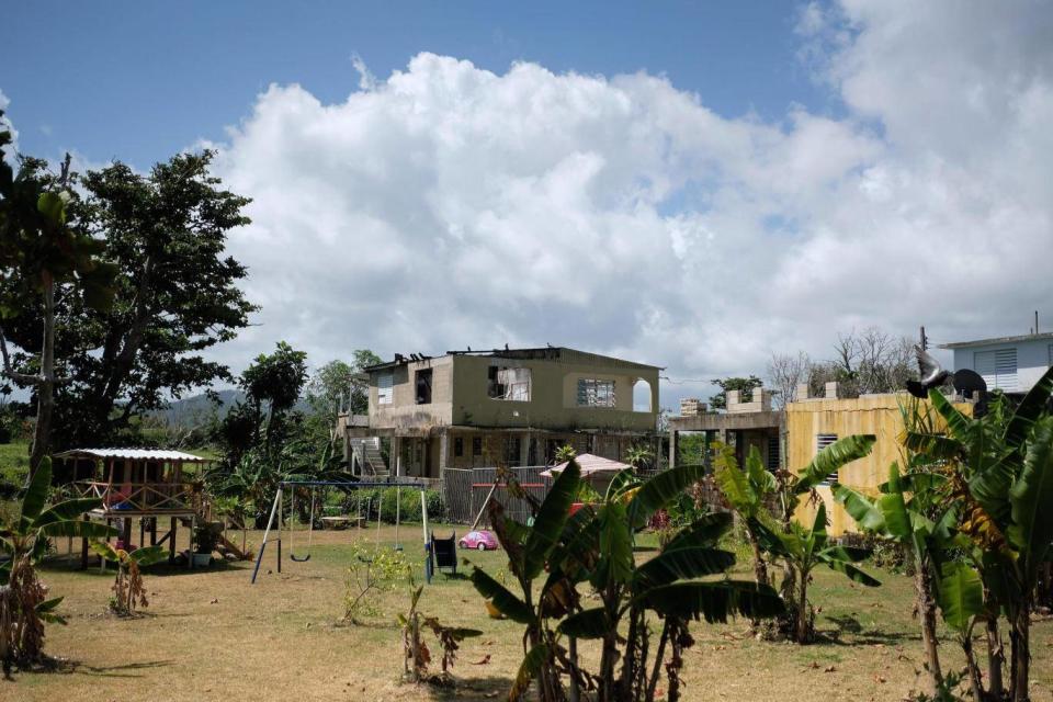 Partially destroyed houses are seen six months after Hurricane Maria affected Puerto Rico in Fajardo (Ricardo Arduengo/AFP/Getty Images)