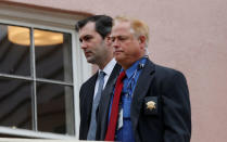 Former North Charleston police officer Michael Slager is escorted to the courthouse by security personnel while waiting on his verdict at the Charleston County Courthouse in Charleston, South Carolina, U.S., December 5, 2016. REUTERS/Randall Hill