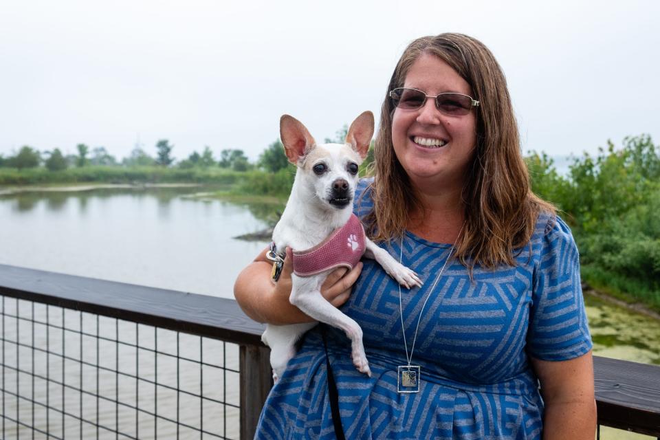 Lisa Beedon poses with her dog Rosey, a then-8-year-old Rat Terrier on Thursday, July 17, 2020, in Port Huron.