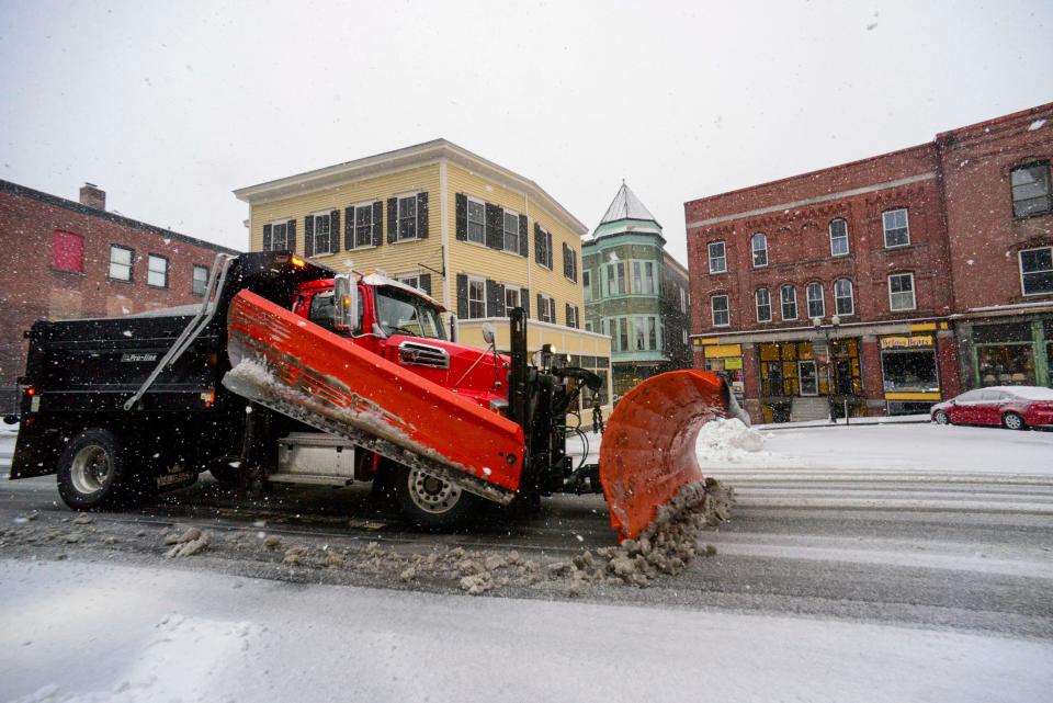 A snowblower truck from Rockingham Highway Department clears the snow from downtown Bellows Falls, Vt., on Thursday, April 4, 2024. (Kristopher Radder/The Brattleboro Reformer via AP)