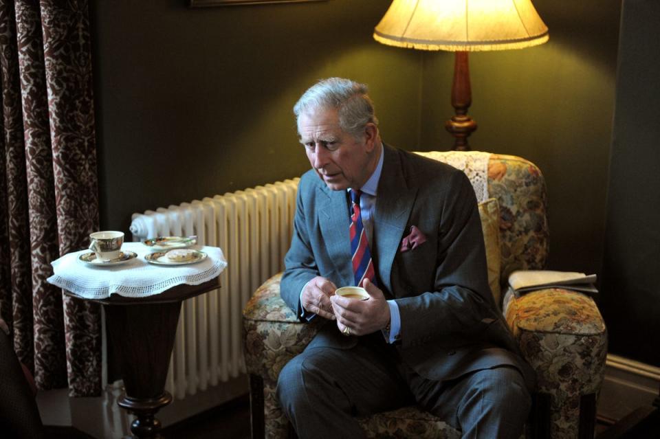 Charles in the living room of the birthplace of Dylan Thomas in Swansea (Tim Ireland/PA) (PA Archive)