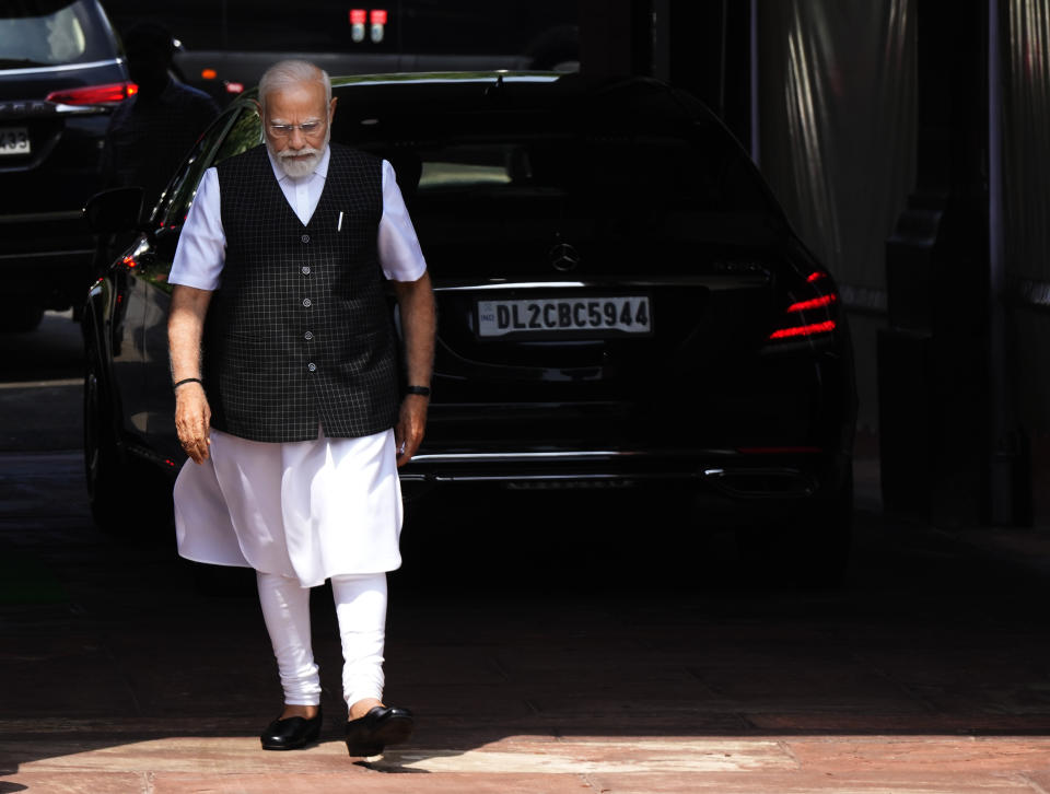 Indian Prime Minister Narendra Modi arrives on the opening day of the monsoon session of the Indian parliament in New Delhi, India, Thursday, July 20, 2023. Modi Thursday broke more than two months of his public silence over the deadly ethnic clashes that have marred the country's remote northeast Manipur state, a day after a viral video showed two women being paraded naked by a mob, sparking outrage across the nation. (AP Photo/Manish Swarup)