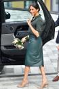 <p>Another clever outfit choice from Meghan here around the 10-week mark. Wearing a Hugo Boss high-waisted pencil skirt in a rigid material like leather meant it skimmed over her ever-so-slightly protruding stomach.</p>