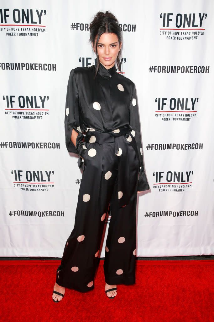 <p>The model wore a Petar Petrov polkadot two-piece to the first annual 'If Only' Texas hold'em charity poker tournament.</p>