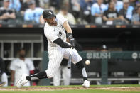 Chicago White Sox's Tommy Pham singles off Tampa Bay Rays starting pitcher Aaron Civale during the third inning of a baseball game Saturday, April 27, 2024, in Chicago. (AP Photo/Charles Rex Arbogast)