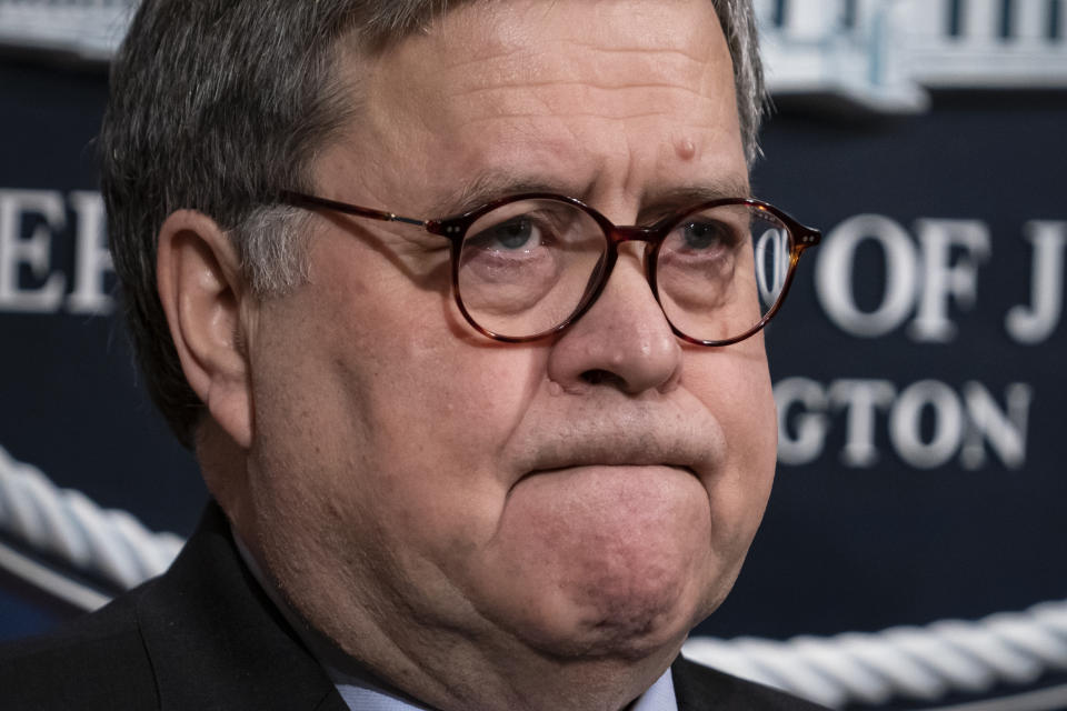 FILE - In this Jan. 13, 2020, file photo Attorney General William Barr speaks to reporters at the Justice Department in Washington to announce results of an investigation of the shootings at the Pensacola Naval Air Station in Florida. The Justice Department has placed a high national-security priority on its probe of the incident, insisting that investigators must get access to data from two locked and encrypted iPhones that belonged to the alleged gunman, a Saudi aviation student. (AP Photo/J. Scott Applewhite, File)