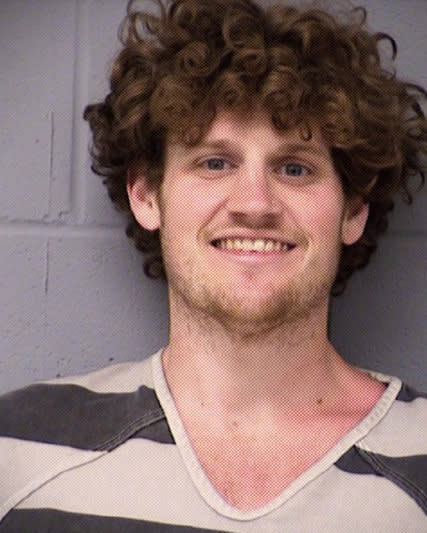 Brandon Hicks's mugshot after he was arrested on suspicion of assaulting a public servant.