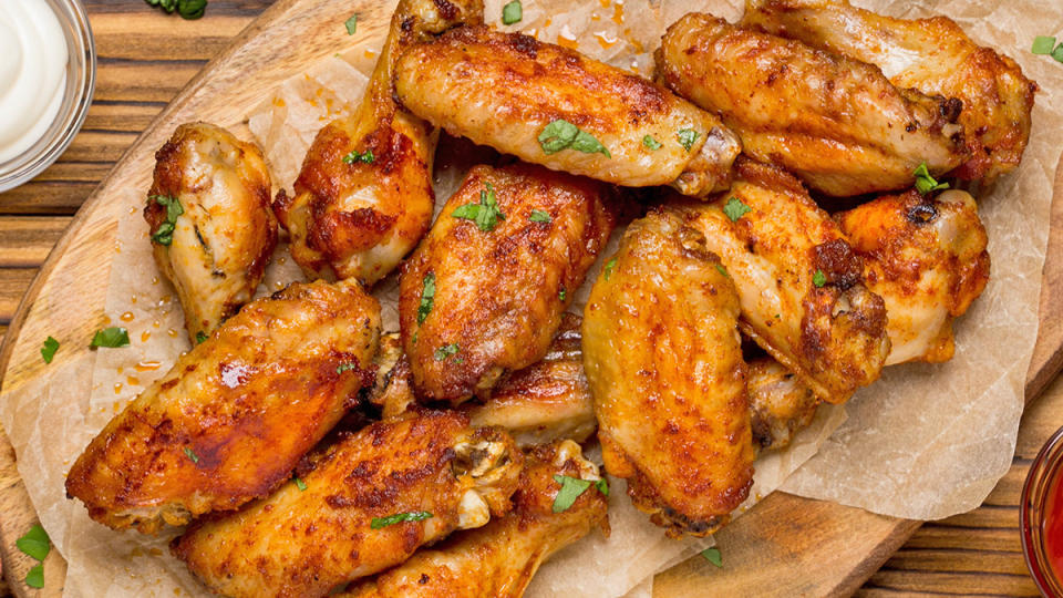 Honey Dijon wings being showcased as part of a guide on reheating them in the oven