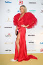 Leila McKinnon arrives at the 2019 TV Week Logie Awards at The Star on the Gold Coast in a red hot Constantina Danis gown. Photo: Getty