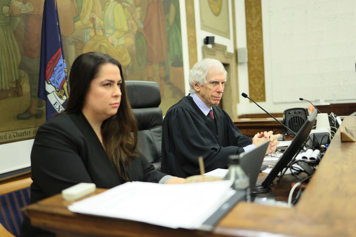 Justice Arthur Engoron presides over the civil fraud trial of former President Donald Trump and his children at New York State Supreme Court on Nov. 13, 2023, in New York. Seated next to him is clerk Allison Greenfield.