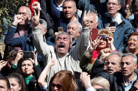 Supporters of the main opposition Republican People's Party (CHP) shout anti-government slogans during a protest against the attack on their leader Kemal Kilicdaroglu, in Istanbul, Turkey, April 22, 2019. REUTERS/Murad Sezer