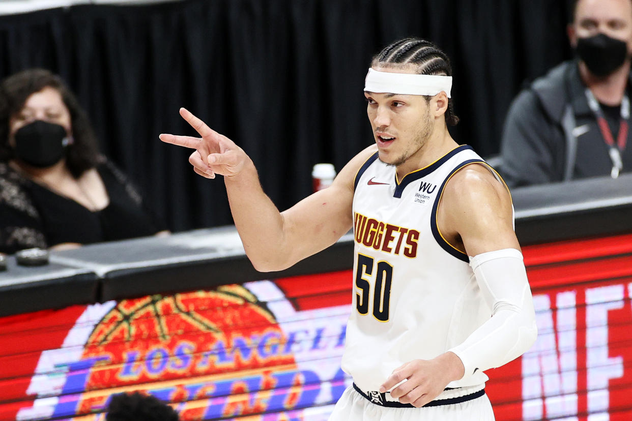 PORTLAND, OREGON - JUNE 03: Aaron Gordon #50 of the Denver Nuggets reacts after his three point basket against the Portland Trail Blazers in the fourth quarter during Round 1, Game 6 of the 2021 NBA Playoffs at Moda Center on June 03, 2021 in Portland, Oregon. NOTE TO USER: User expressly acknowledges and agrees that, by downloading and or using this photograph, User is consenting to the terms and conditions of the Getty Images License Agreement. (Photo by Steph Chambers/Getty Images)