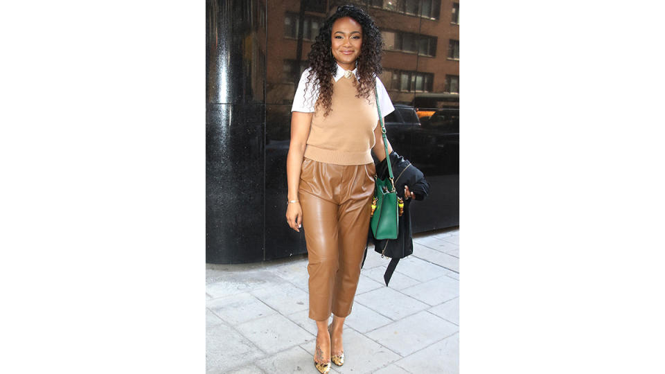 Tatyana Ali in brown leather outfit