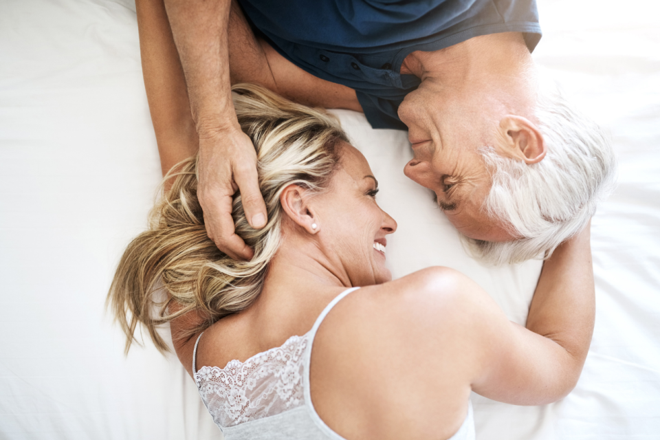 How do couples navigate physical intimacy when one or both partners live with chronic pain? (Image via Getty Images)