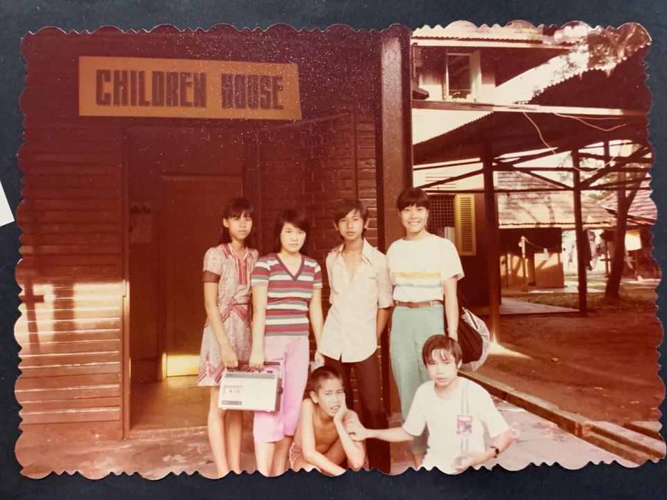 Alvina Khoo (right), aged 21 at the time, with some of her students at the Vietnamese refugee camp in Hawkins Road, Sembawang in Singapore, 1985. PHOTO: Alvina Khoo