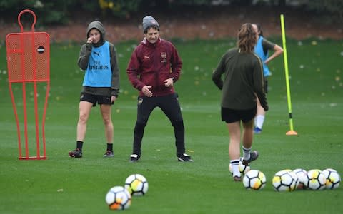 Joe Montemurro directs Arsenal Women in training at London Colney - Credit: getty images