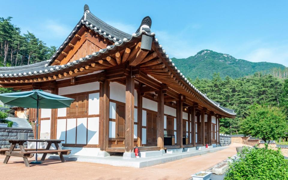 Tourists can stay in traditional-style guesthouses called hanoks.