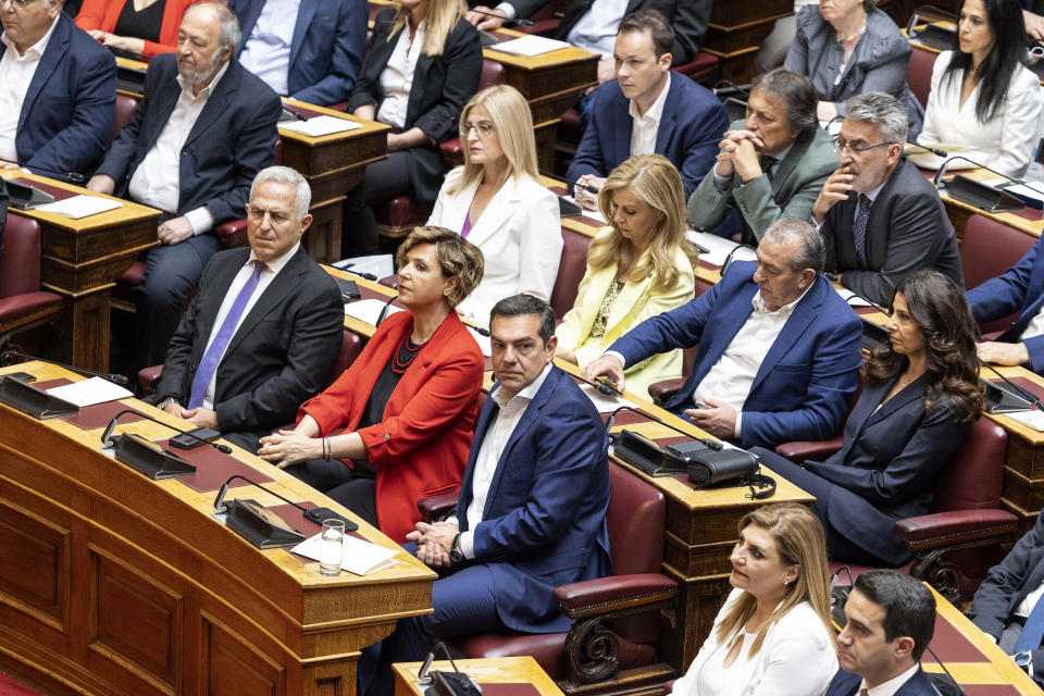 SYRIZA-Progressive Alliance leader Alexis Tsipras, center, attends a swearing in ceremony at the parliament in Athens, Greece, Sunday, May 28, 2023. Newly elected Greek lawmakers were sworn in Sunday, but the Parliament elected on May 21 could be dissolved as early as Monday and a new election campaign start for another election, on June 25. (AP Photo/Yorgos Karahalis)