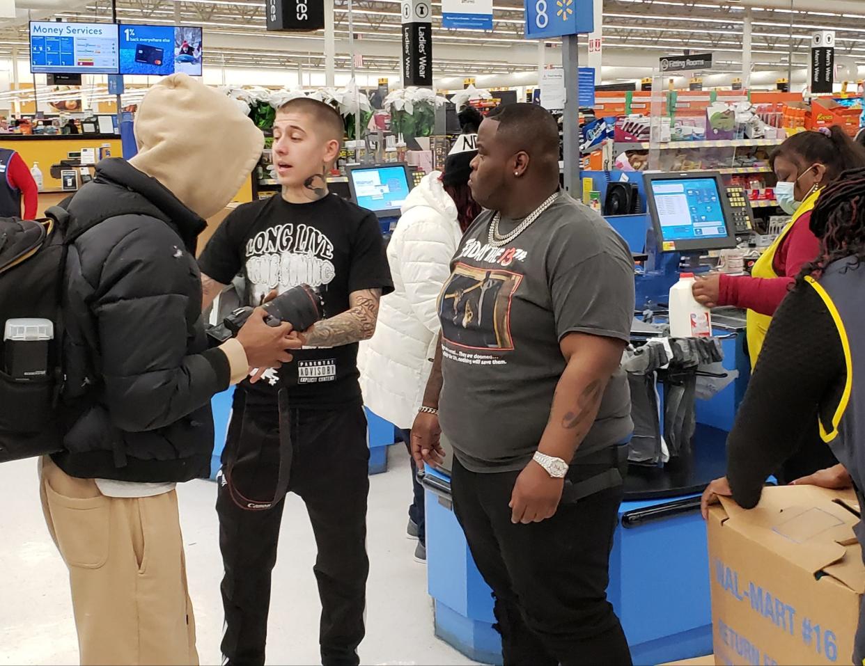 Hip-hop artist Morray and barber Vic Blends appeared at Walmart on Hope Mills on Tuesday afternoon, Dec. 21, 2021. Vic Blends is returning to the area Friday, Dec. 23, 2022, for the 3rd Annual Vic Blends Christmas Giveback.