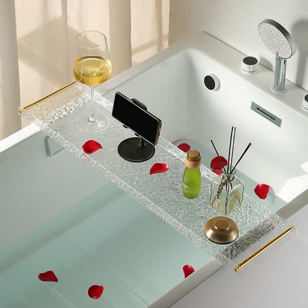 <p><a href="https://go.redirectingat.com?id=74968X1596630&url=https%3A%2F%2Fwww.homary.com%2Fitem%2Facrylic-water-ripple-bathtub-tray-clear-bathroom-caddy-shelf-with-gold-handles-47322.html&sref=https%3A%2F%2Fwww.housebeautiful.com%2Fshopping%2Fhome-accessories%2Fg27703085%2Fbest-bathtub-trays%2F" rel="nofollow noopener" target="_blank" data-ylk="slk:Shop Now;elm:context_link;itc:0;sec:content-canvas" class="link ">Shop Now</a></p><p>Acrylic Water Ripple Bathtub Tray </p><p>homary.com</p><p>$65.99</p>