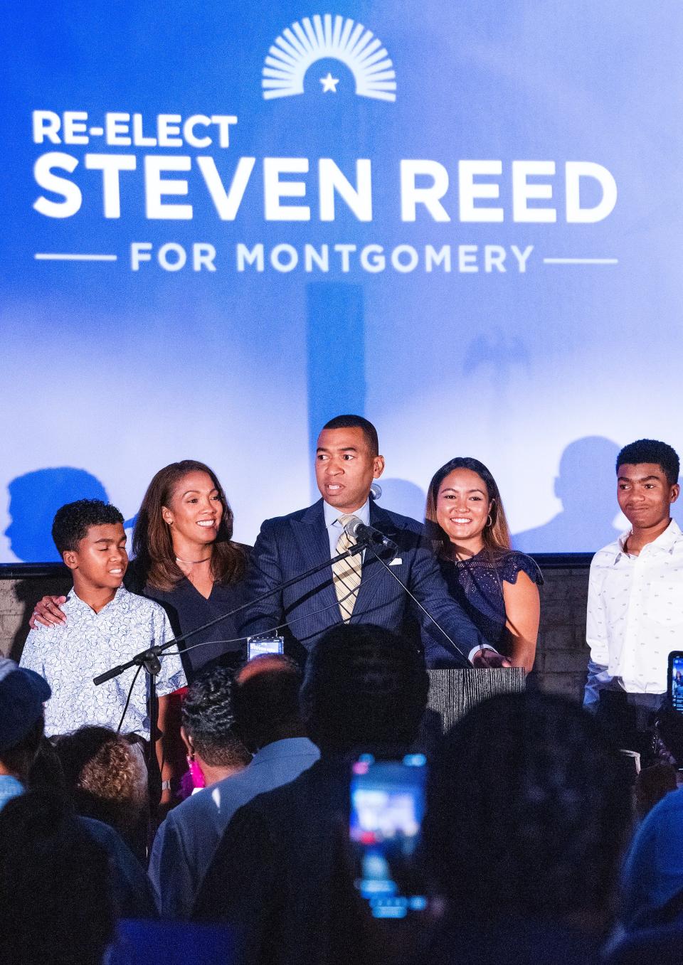 Montgomery Mayor Steven Reed is surrounded by his family as he declares victory August 22 at the Equal Justice Initiative’s Legacy Hall.