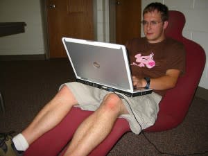 Guy on bean bag in office