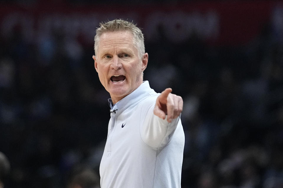 Golden State Warriors head coach Steve Kerr gestures during the first half of an NBA basketball game against the Los Angeles Clippers Tuesday, Feb. 14, 2023, in Los Angeles. (AP Photo/Mark J. Terrill)