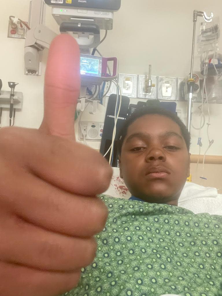 Teddy Temple recovers at a hospital after he was attacked on Oct. 5 by another student in what authorities say was a "bias-motivated crime." His father says the attack was because his son was Black.