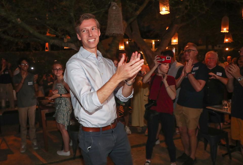 Congressional candidate Will Rollins is welcomed by supporters during his victory party for the 41st Congressional District race in Palm Springs, Calif., June 7, 2022. 