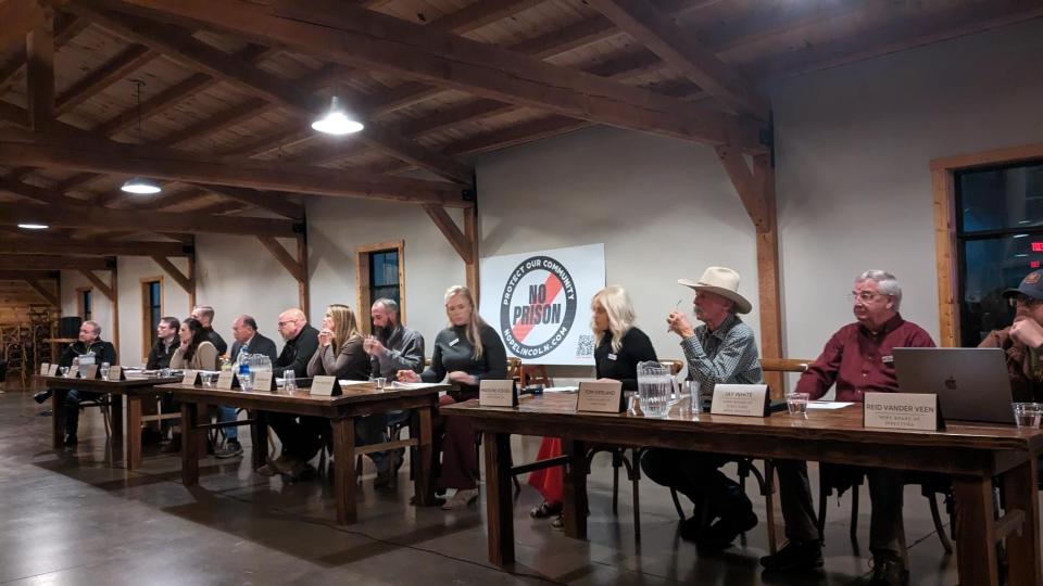 County officials and NOPE board of members on a panel at NOPE's second public forum Dec. 21, 2023, in Harrisburg, South Dakota.