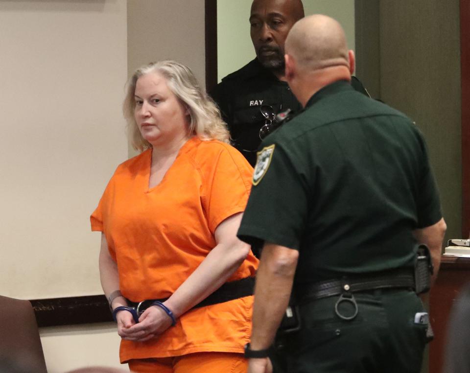 Tammy 'Sunny' Sytch is escorted to the defense table by Volusia Sheriff's Office bailiffs, Monday, Nov. 27, 2023, during her sentencing.