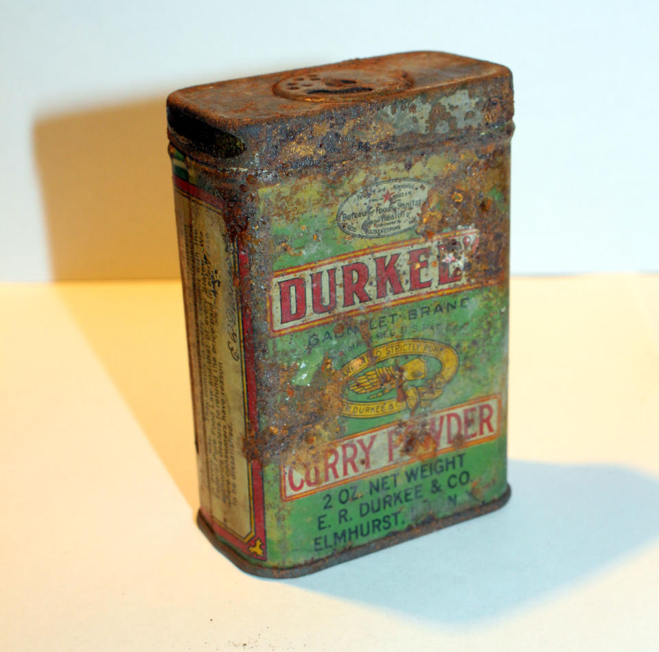 <p>This Durkees curry powder tin was found under the floorboards of an apartment in 2008. (Photo: Caters News) </p>