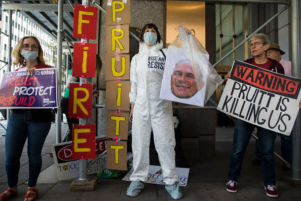 Protestors rally against Environmental Protection Agency (EPA) Administrator Scott Pruitt outside the federal office building that houses the New York City office of the EPA, June 6, 2018. Pruitt is under fire again this week after emails showed he asked an EPA staff member to contact Chick-fil-A for potential business opportunities for his wife. Federal ethics rules prohibit government employees from using their positions for private gain and prohibit supervisors from directing subordinates to carry out personal errands. Earlier in the week it was also disclosed that Pruitt asked an aide to inquire with the Trump International Hotel about purchasing a used mattress. (Photo by Drew Angerer/Getty Images)