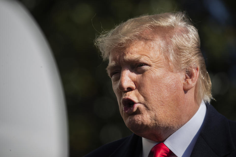 President Donald Trump speaks to reporters upon arrival at the White House in Washington, Sunday, Nov. 3, 2019. (AP Photo/Manuel Balce Ceneta)