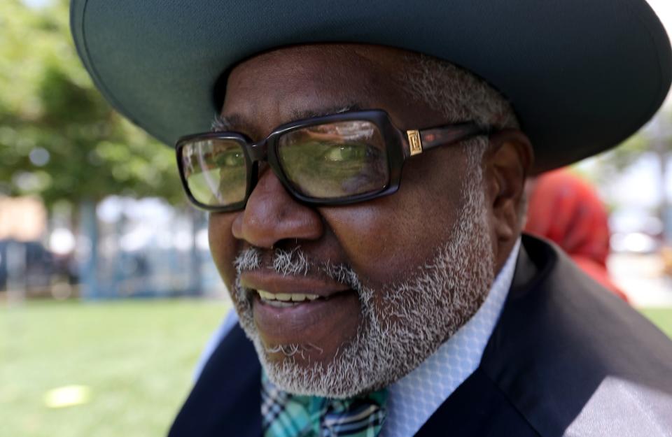 South L.A. resident Jonathan Moseley relaxes in Leimert Park, which reopened in on Saturday.