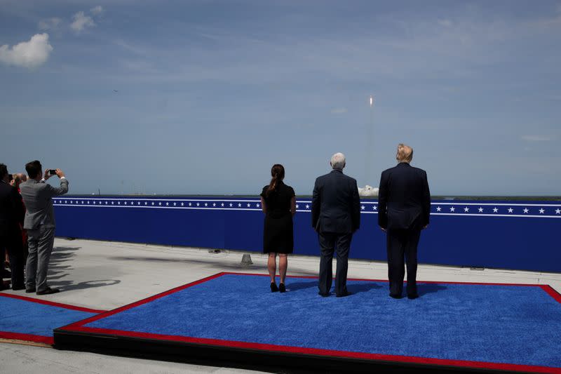 U.S. President Trump watches the launch of a SpaceX Falcon 9 rocket and Crew Dragon spacecraft, from Cape Canaveral, Florida