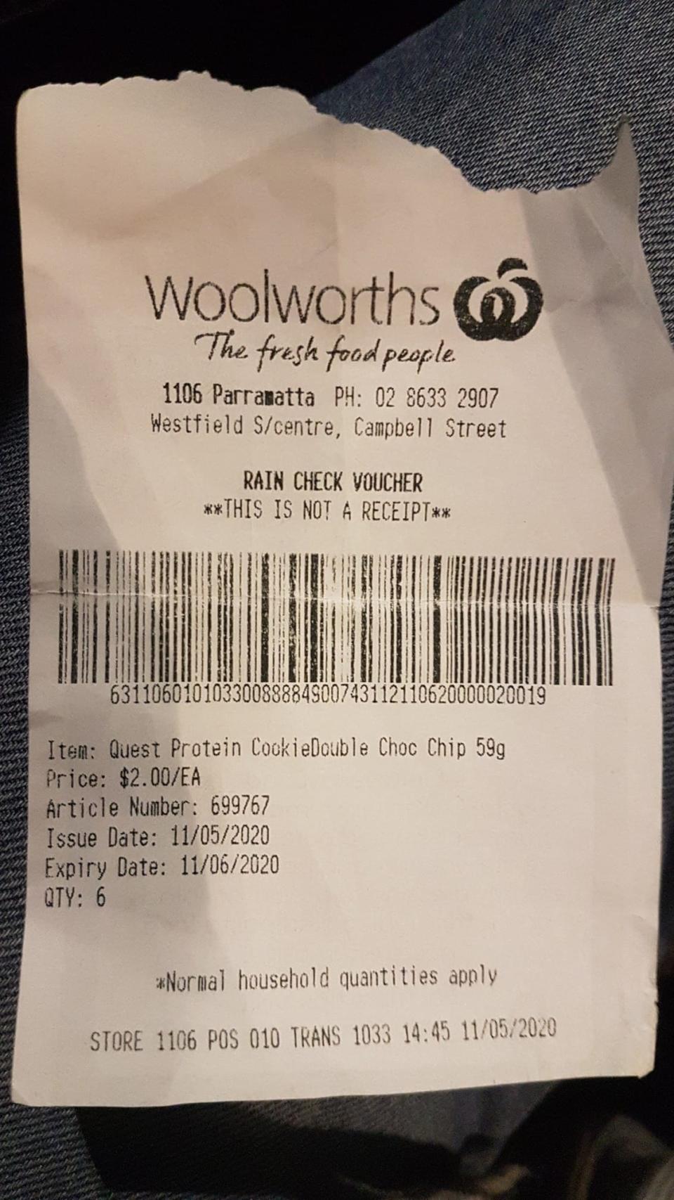 A rain check voucher is pictured from Woolworths for $12 worth of protein bars.