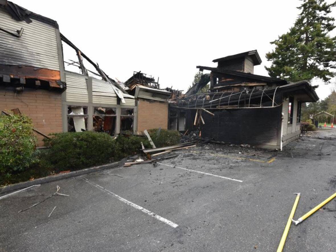 Police say the fire in the two-storey commercial medical-dental building was reported at about 4 a.m. on Jan. 1, 2020. It was home to two dental practices and a music school. (Delta Police - image credit)