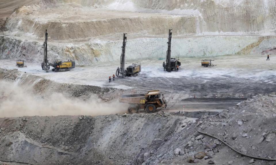 A truck arrives to ferry excavated gold, copper and zinc ore from the main mining pit at the Bisha Mining Share Company in Eritrea