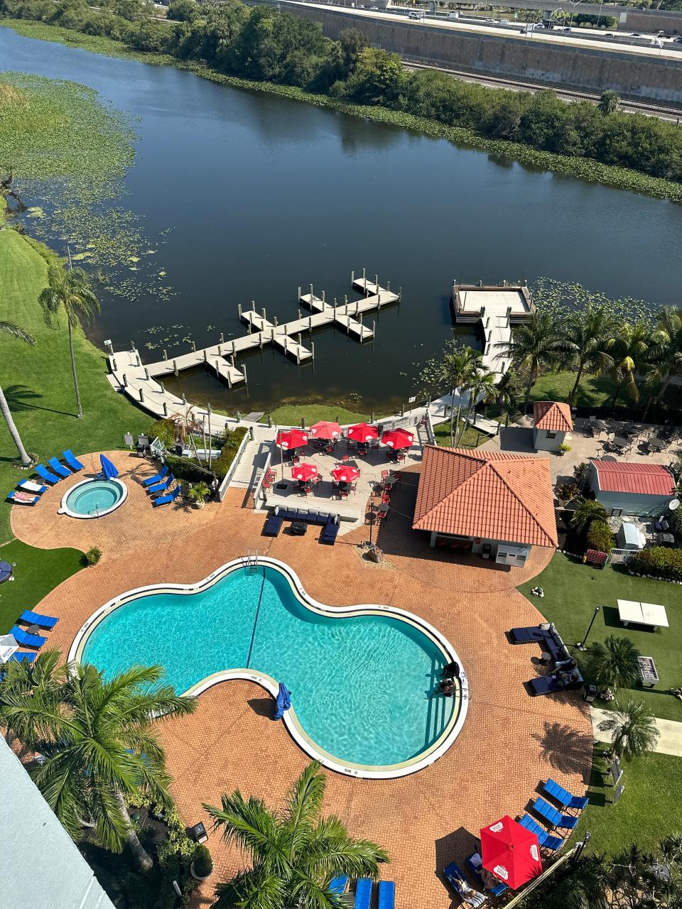 Lakeside Tiki Bar at the Hilton Palm Beach Airport overlooks Pine Lake and has 14 boat slips to accommodate those arriving by watercraft from residences along Lake Clarke, Lake Osborne and Lake Ida.