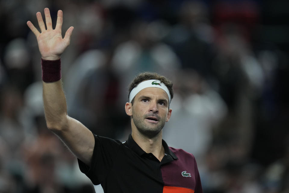 Grigor Dimitrov of Bulgaria reacts after defeating Nicolas Jarry of Chile in the men's singles quarterfinal match of the Shanghai Masters tennis tournament at Qizhong Forest Sports City Tennis Center in Shanghai, China, Friday, Oct. 13, 2023. (AP Photo/Andy Wong)